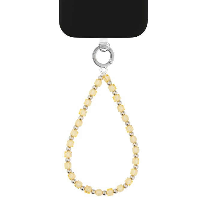 Apyrankė telefonui iDeal Of Sweden Wristlet Strap Soft Lemon